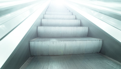 steps of escalator in business center