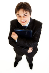 Smiling modern businessman holding laptops in hand