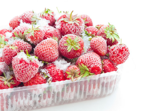 Closeup Of Frozen Strawberries In Opened Box