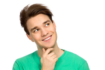 Fototapeta premium Young man looking up