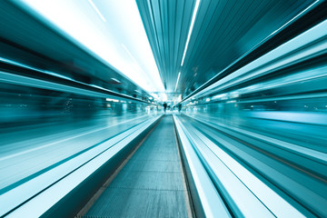 movement of abstract blue escalator with people