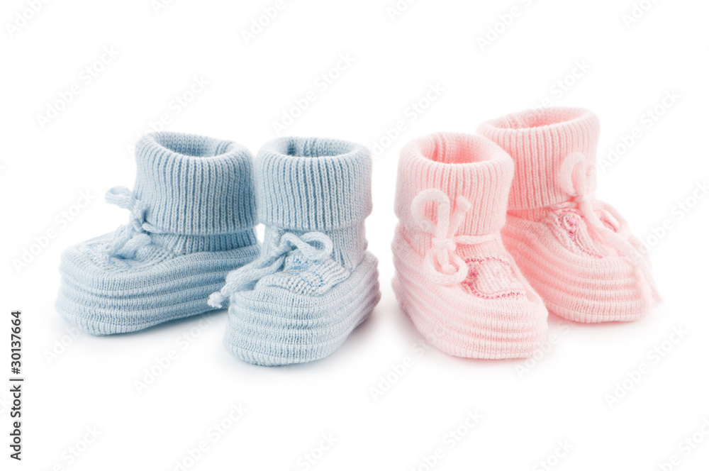 Wall mural woven baby shoes isolated on white background