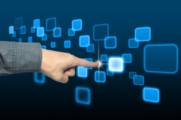 hand pushing a button on a touch screen interface