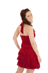 Brunette woman in red dress back