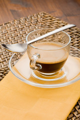 Caffè Espresso su tovagliolo giallo