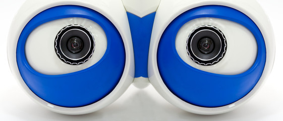 Eyes of the robot. A white robotic eyes looking