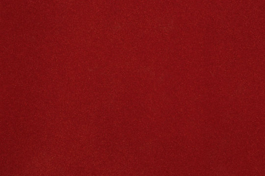 Texture of dense cardboard with vinous velvety  coating