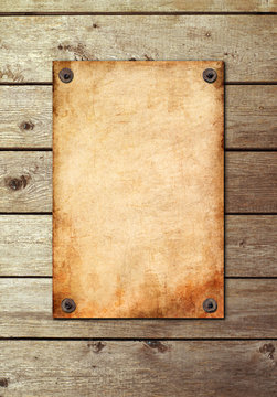 Vintage page on a wooden wall