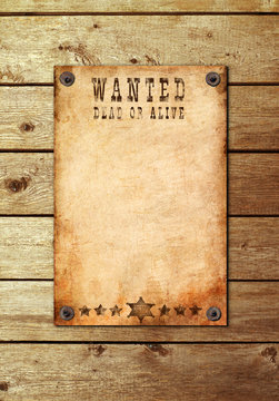 Vintage wanted poster on a wooden wall