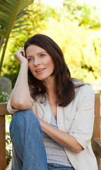 Portrait of a lovely woman in the garden