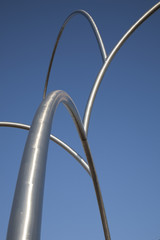 Fototapeta na wymiar Abstract Steel Bars against Blue Sky Background