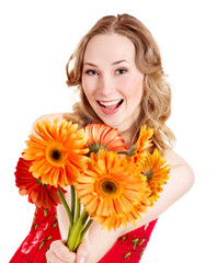 Happy young woman giving flowers.