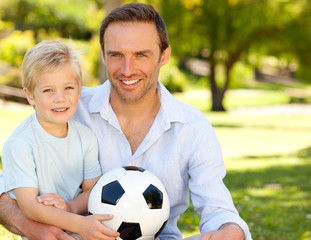 Father with his son after a football game