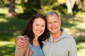 Woman with her father-in-law in the park