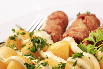 Cevapcici and potatoes