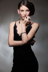 Naklejka premium sexy slim woman in black dress