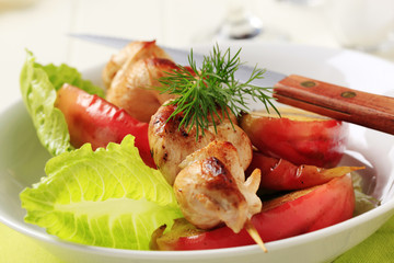 Chicken skewer and baked apple