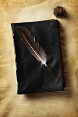 Quill on a old book