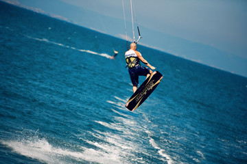 Kitesurfer in a jump © Anna Lisovskaya