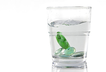 Marbles in a glass of water