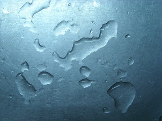 Water on a metal surface.