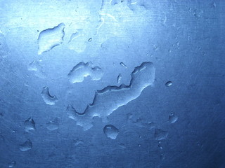 Water on a metal surface.