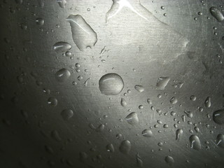 Water drops on an iron surface.