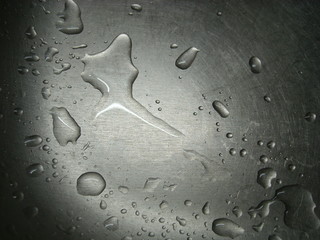 Water on a metal surface.