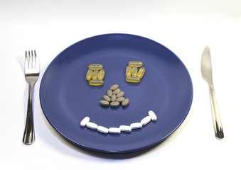 plate full of vitamins and supplements