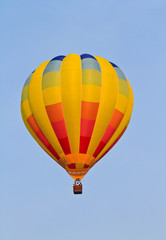 Naklejka premium Colorful hot air balloon in blue sky .
