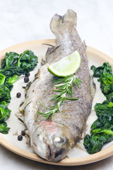 bream baked with Italian herbs and fried spinach
