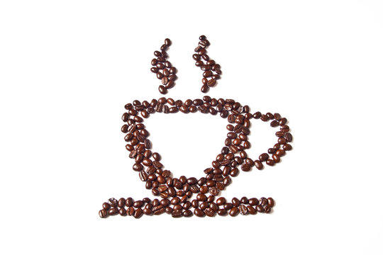 Cup of coffee from coffee beans on white background