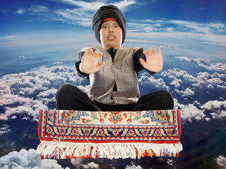 boy on a flying magic carpet