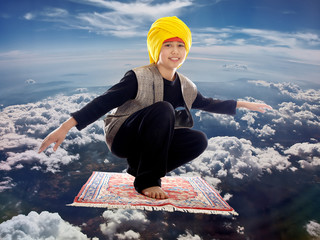 boy on a flying magic carpet