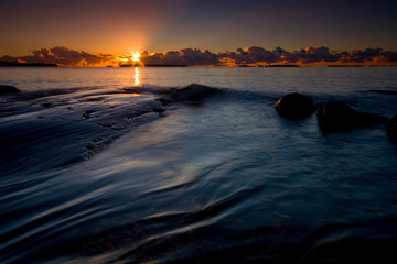 Sunrise and the beach rocks