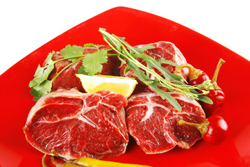 Fototapeta premium fresh beef medallion on red