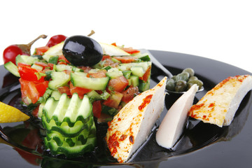 small roast meat chunks on black