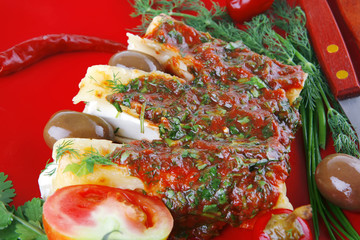 cannelloni served with pepper and tomato