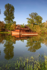 Fototapeta premium Spring landscape with water mill