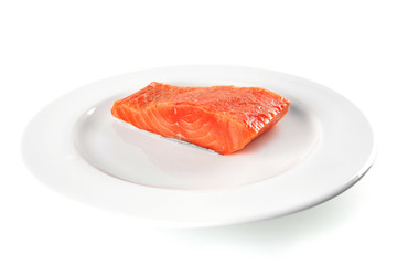 pink smoked salmon on white plate