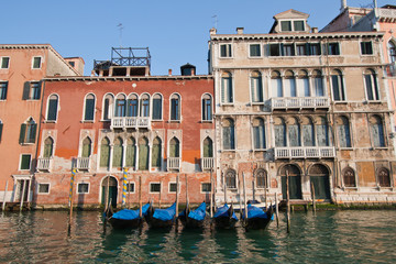 Fototapeta na wymiar goldola boat parking in grand canal Venice Italy