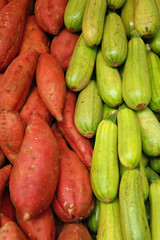 lot of batatas and zucchini on counter