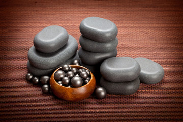 Fototapeta na wymiar Spa massage - black stones