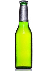 Cold bottle of beer isolated on white