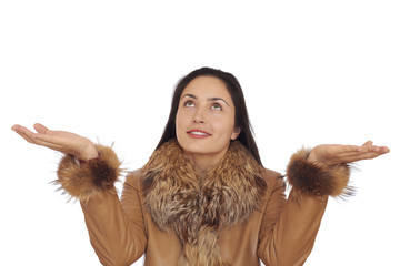 Pretty young brunette woman stretching her hands to up