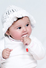 Little girl a on white background. Portrait