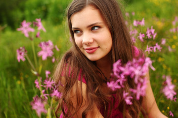 woman on pink flower field