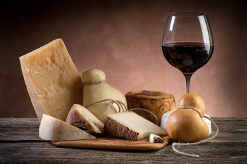 variety of cheese and red wine
