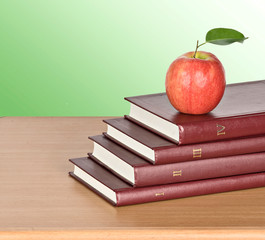 Books and apple
