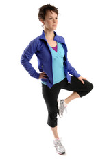 Young sporty woman exercises